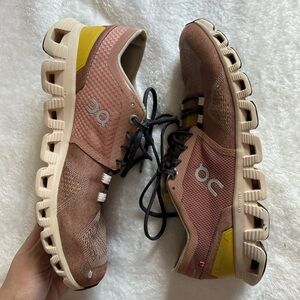 On Cloud X running shoes in the Mocha/Sand colorway